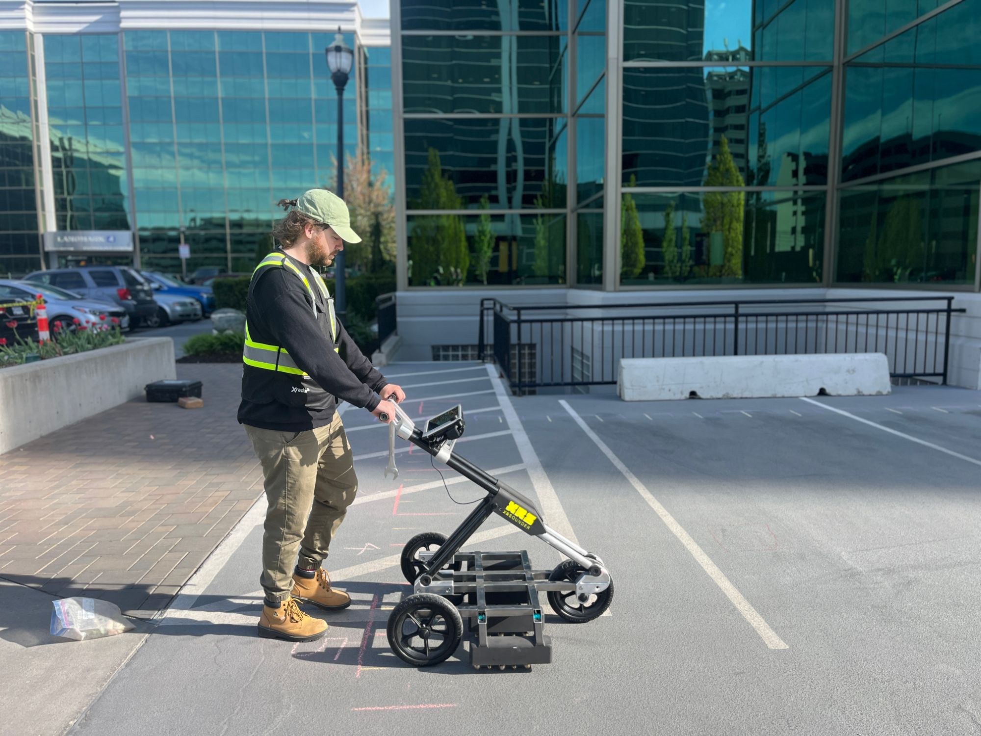 XRSounder operator scanning a parking deck